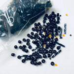 Beautiful Bag of Beads: black and transparent orange