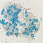 Beautiful Bag of Beads: Clear, light blue, no thread or needle